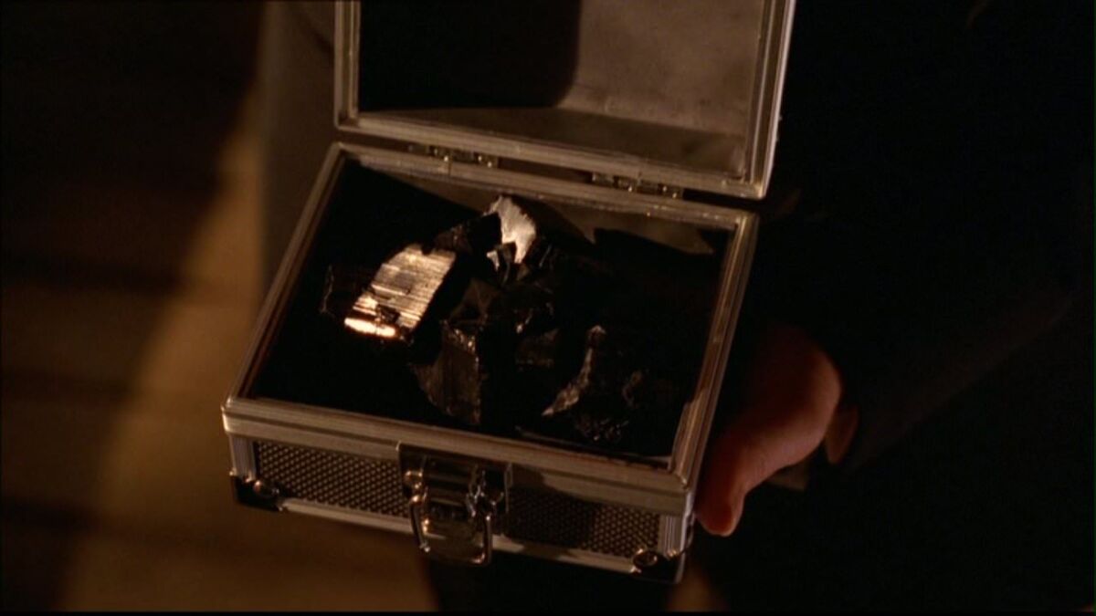 smallville black kryptonite in a secure case