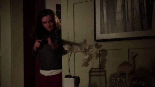 Laurel Lance in Arrow holds a shotgun