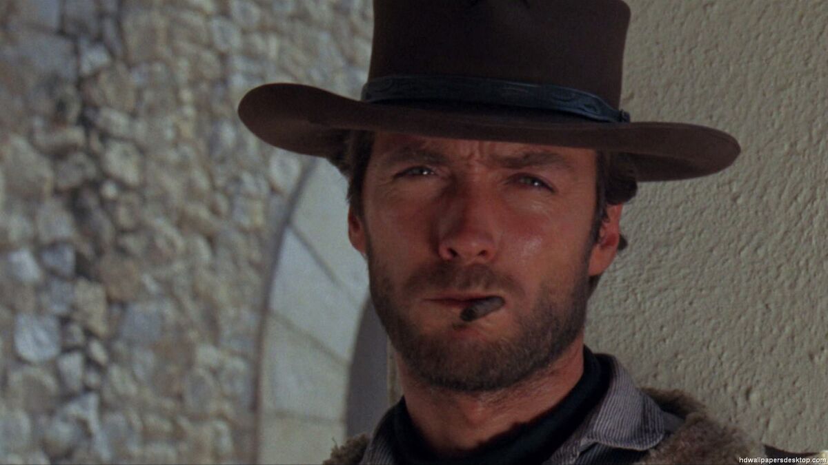 magnificent seven western actors clint eastwood smoking a thin cigar in Dollars trilogy movie