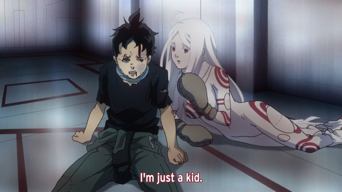 The albino Shiro tries to comfort a bloody and bruised Ganta.