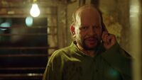 In2x14 Shantaram on phone