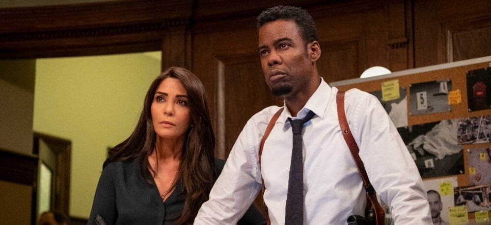 Marisol Nichols as Captain Angie Garza and Chris Rock as Detective Zeke Banks in Spiral.