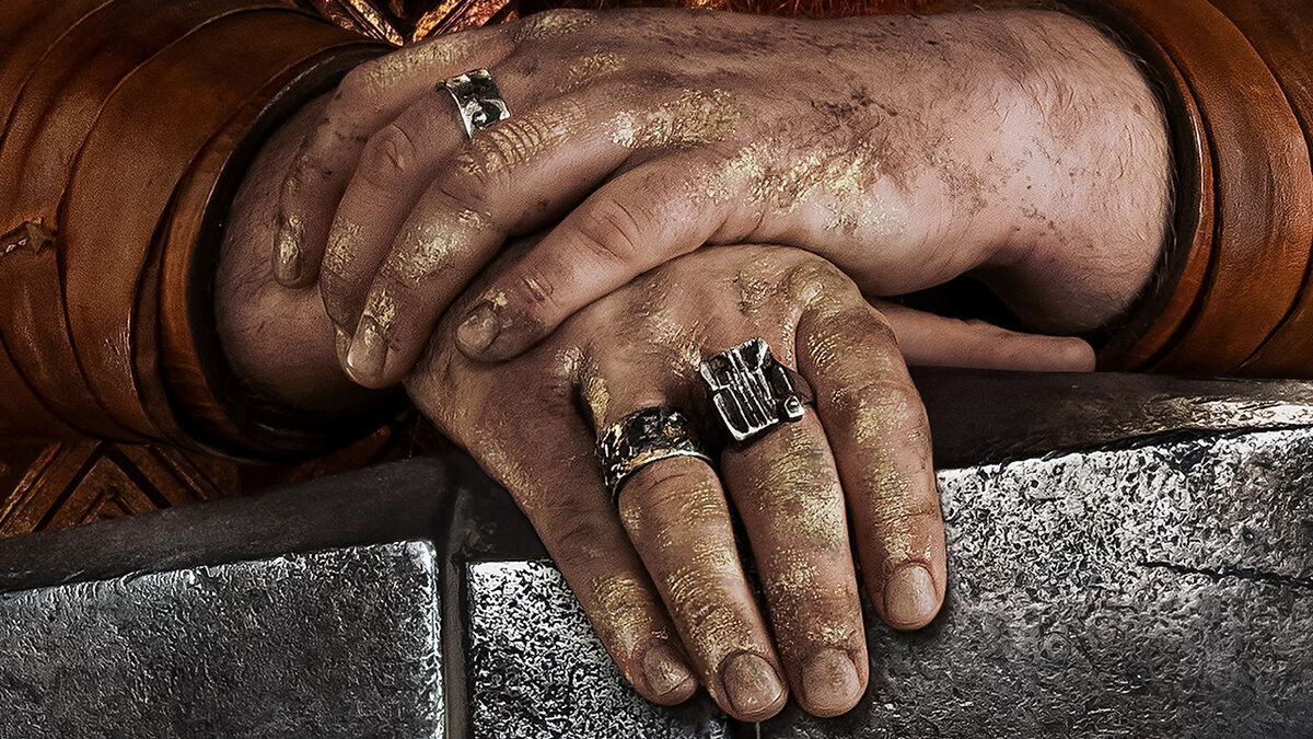 Durin&#039;s poster shows his hands covered in gold.
