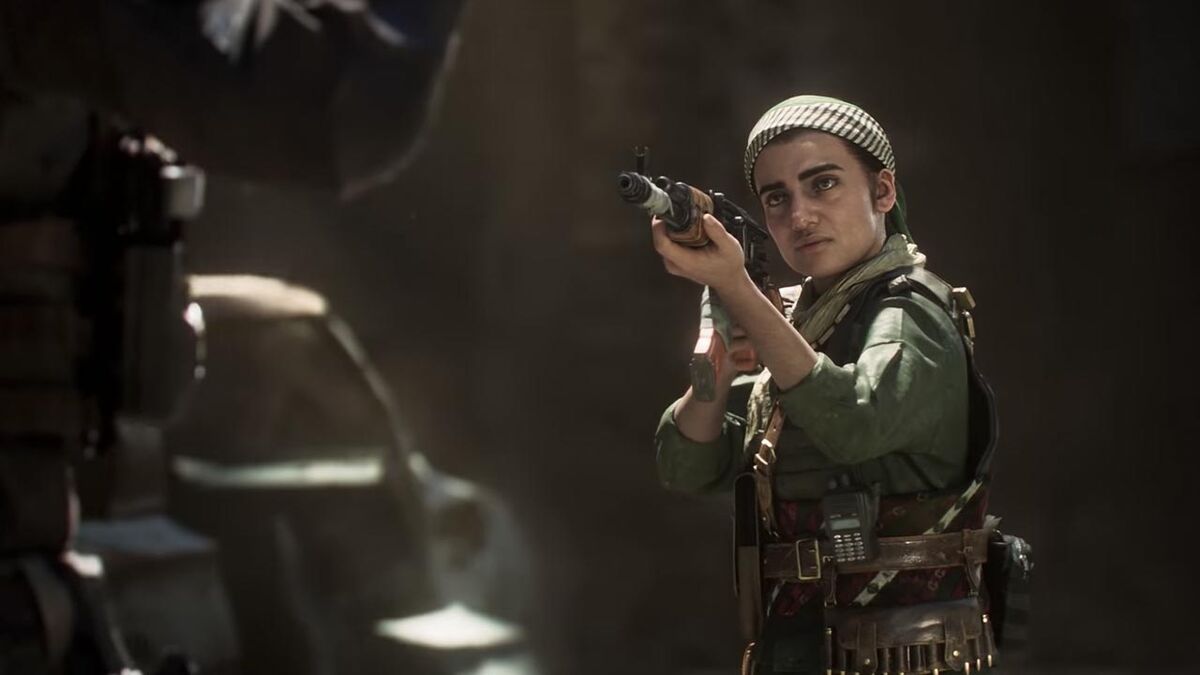 A woman rebel holds a gun to Captain Price.