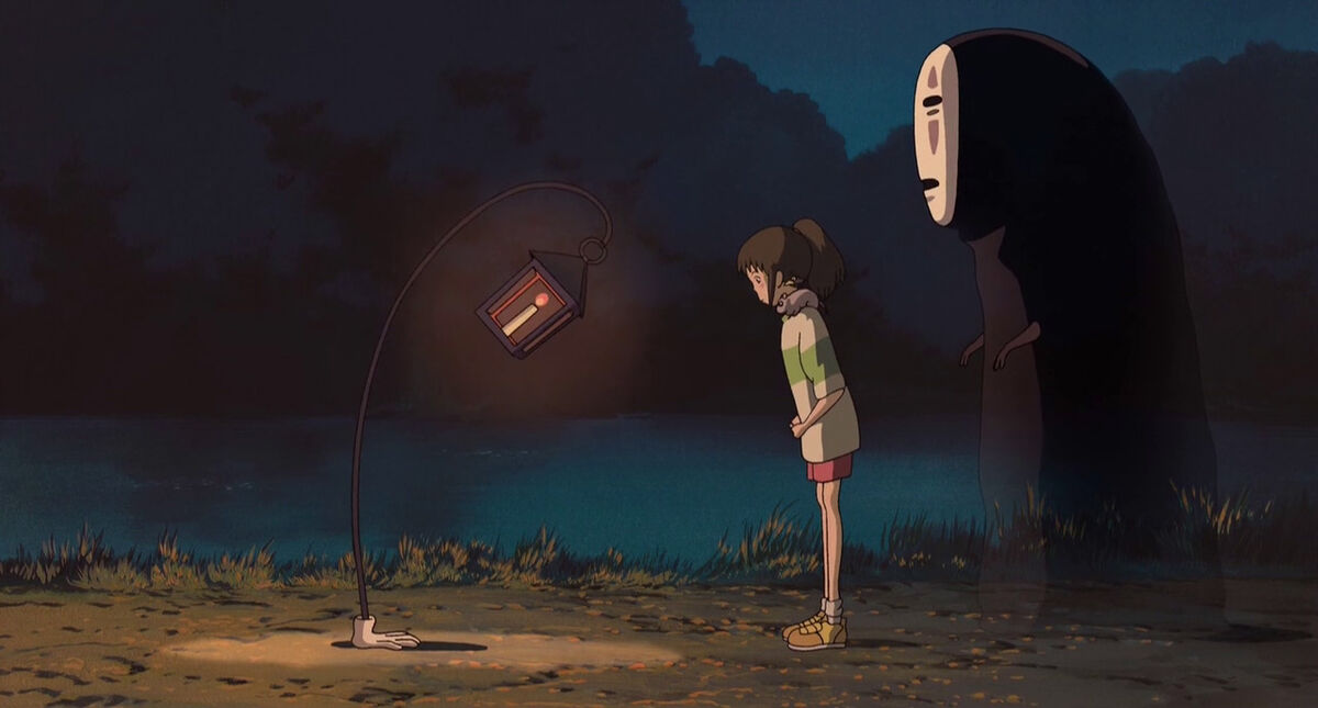 No-Face and Chihiro bow to lamp in Spirited Away