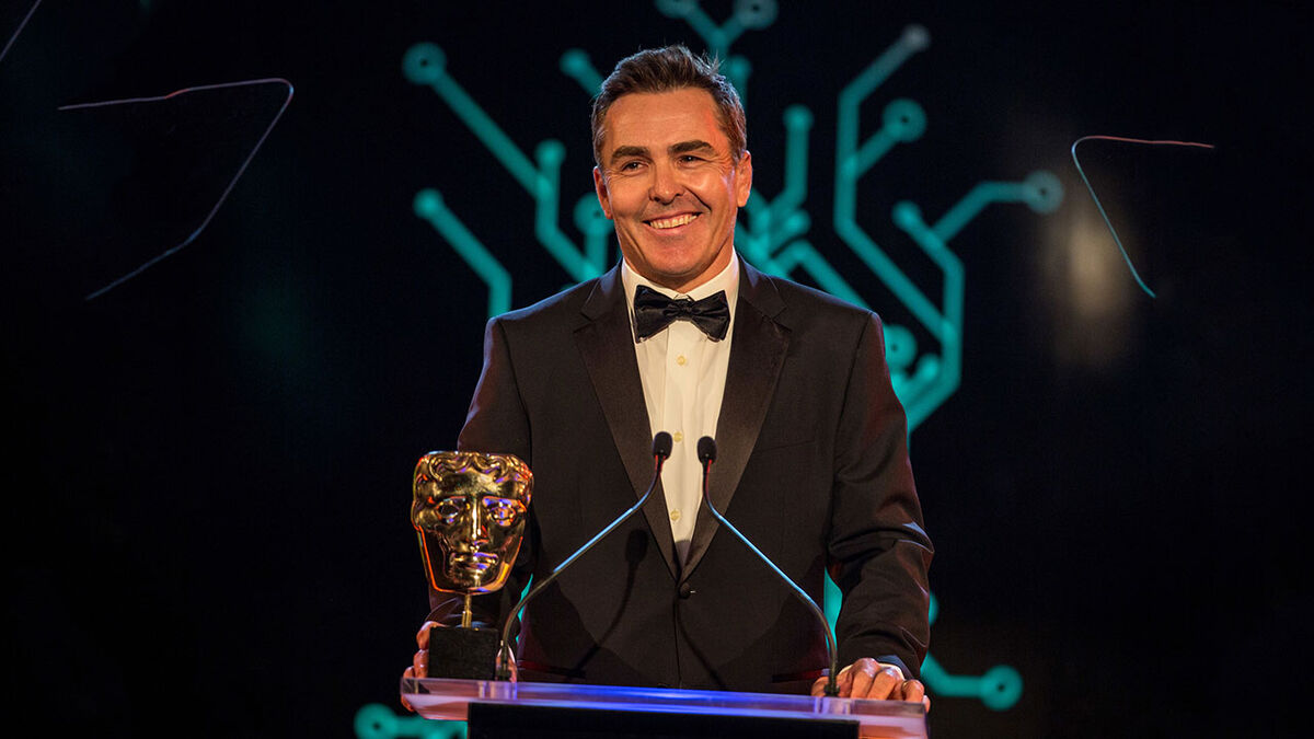 Nolan North presenting at the Game BAFTAs