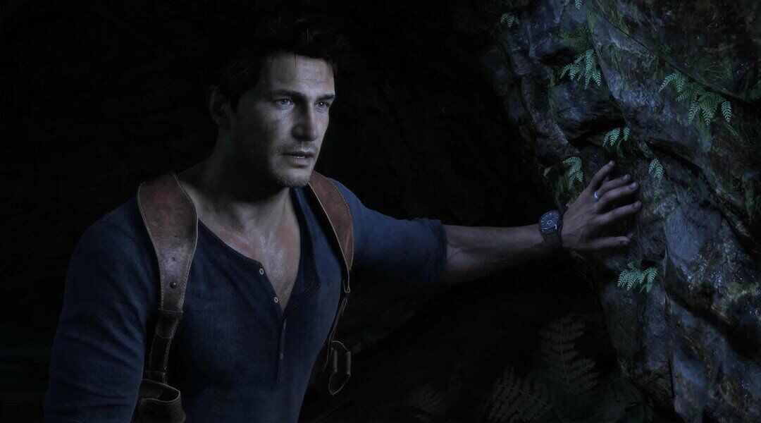 Nathan Drake in cave in Uncharted 4