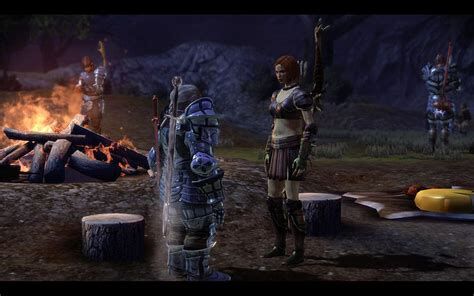 The Warden speaking with Leliana at the party camp.