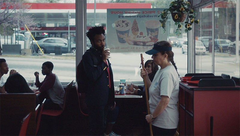 Donald Glover stealing juice from a fast food restaurant in Atlanta