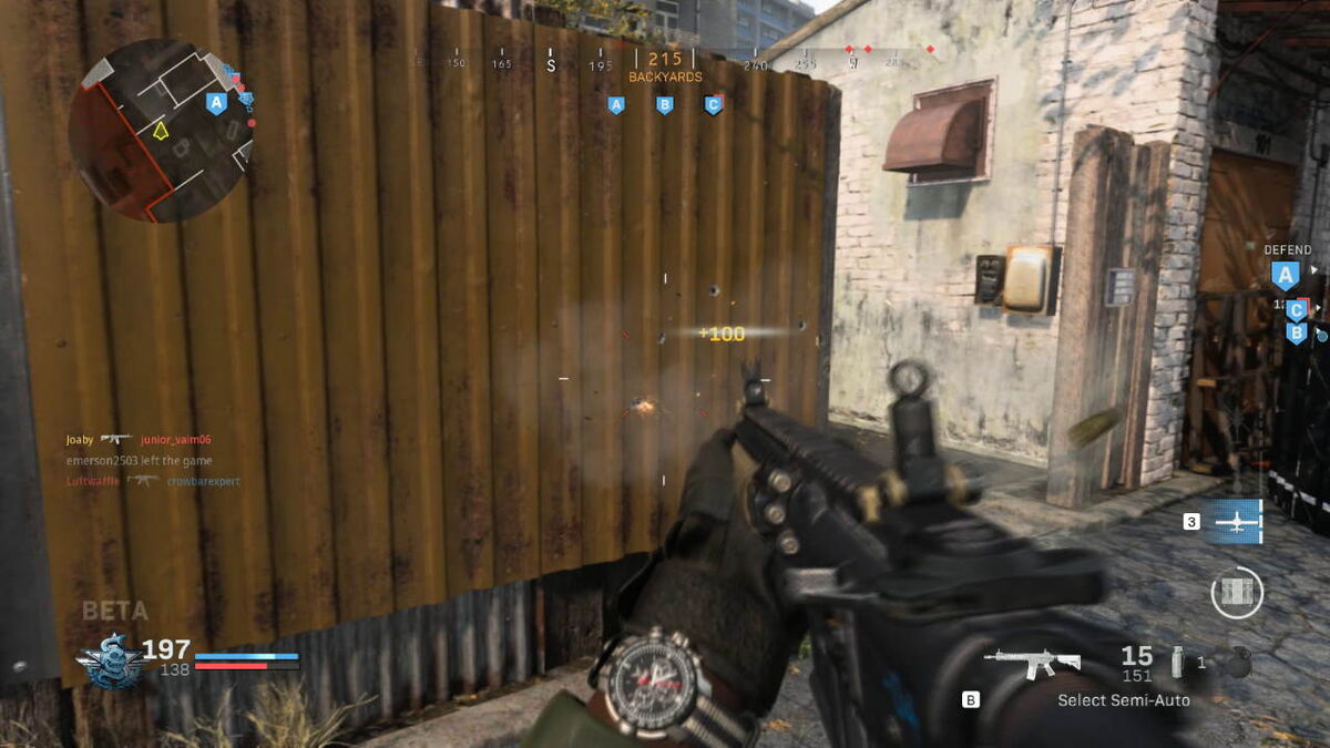 The player fires through a thin metal wall to kill the enemy on the other side.