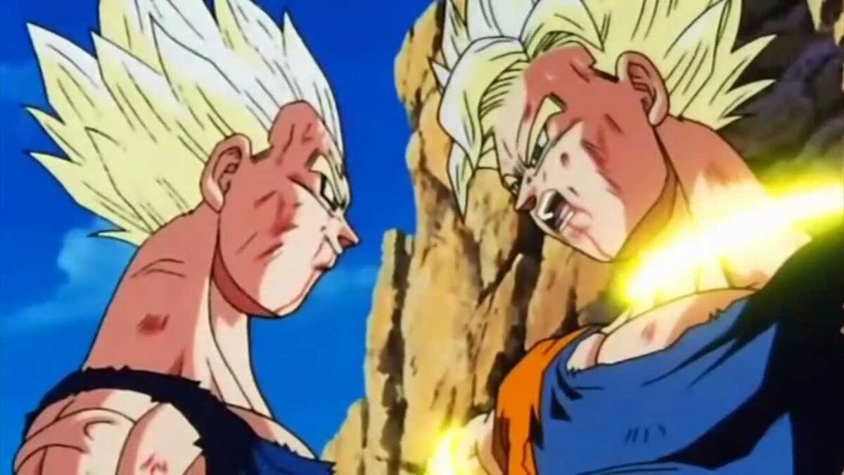 Vegata gloats over an incapacitated Goku. Both are in Super Saiyan mode giving them golden spiky hair and crazy power.