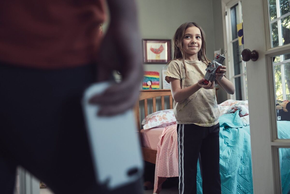 better things episode period middle daughter plays with old robot in bedroom