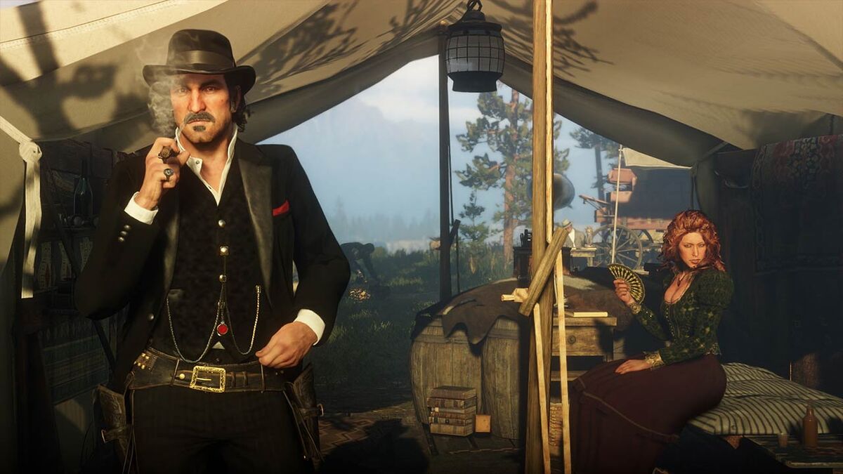 A cowboy in black removes his cigar just long enough to say something bad-ass. Not sure what's being said, but odds are good that them's fightin' words.
