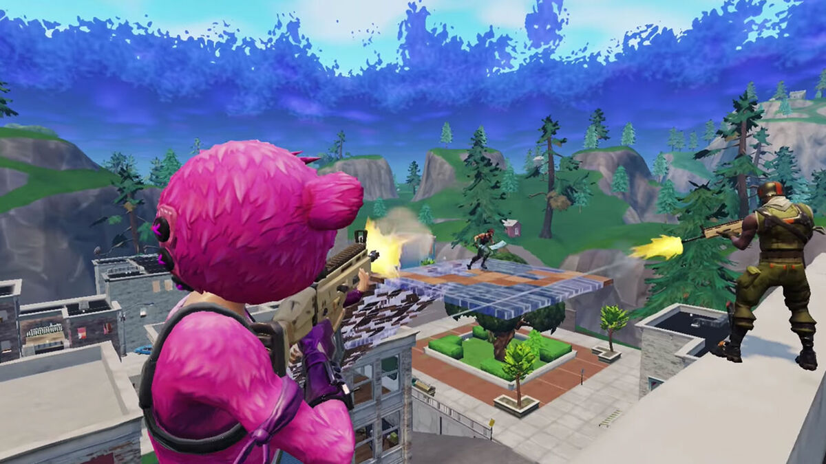 Firing from a rooftop on a builder in Fortnite Mobile