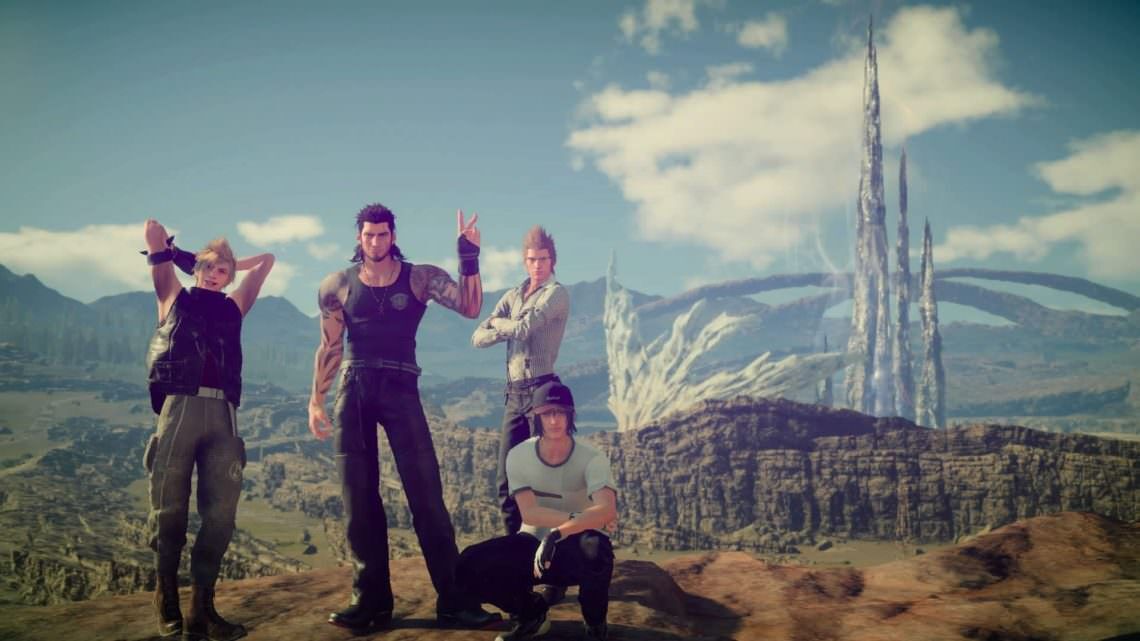 A screenshot of the Final Fantasy XV team taking a group shot.