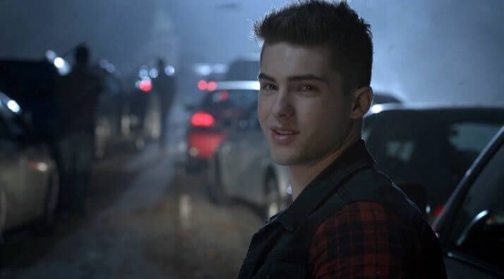 Theo Raeken smiles and waves at Kira during the Beacon Hills traffic Jam at the start of Season 5