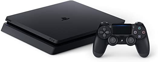 The PlayStation 4 with a Dual Shock 4 controller on the right