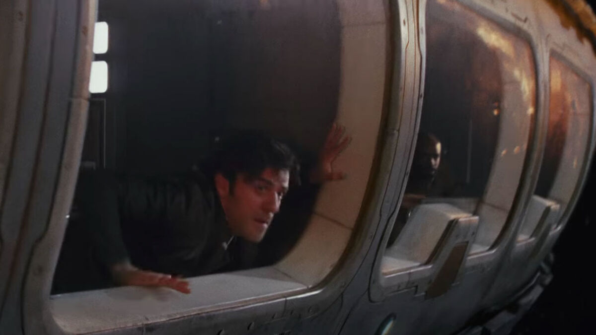 Poe Dameron watches a space battle