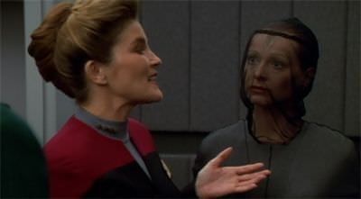 star-trek-voyager-innocence-captain janeway chats with lady who looks like a beekeeper