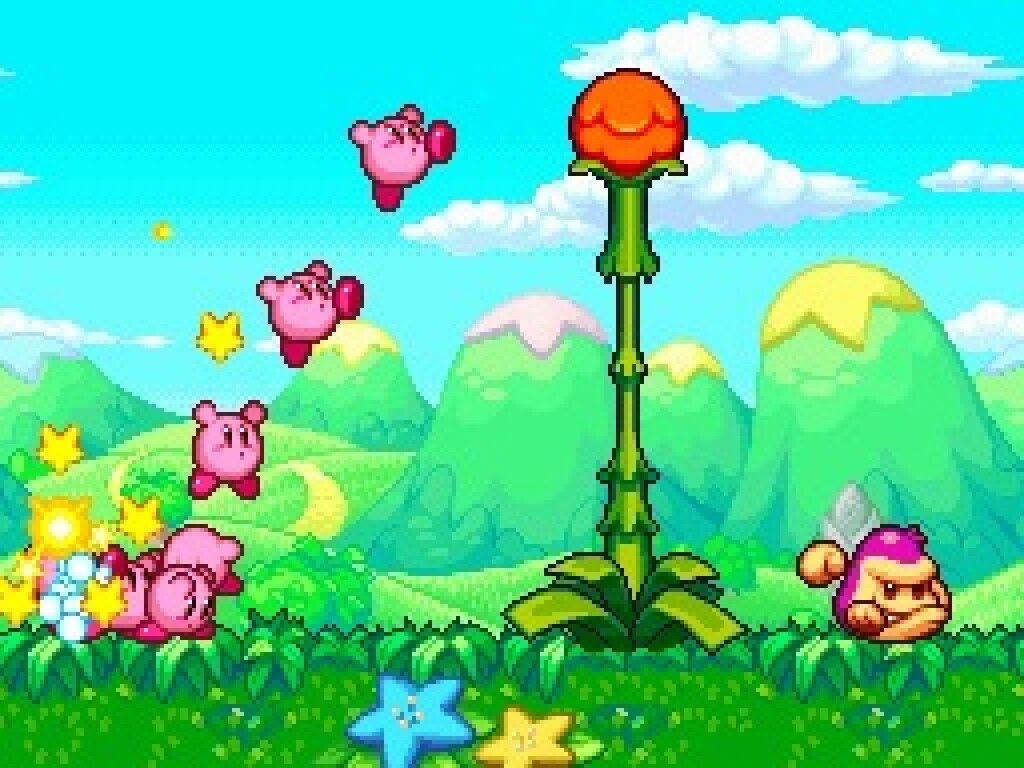 A team of adorably Kirbys (Kirbies?) works together in Kirby Mass Attack.