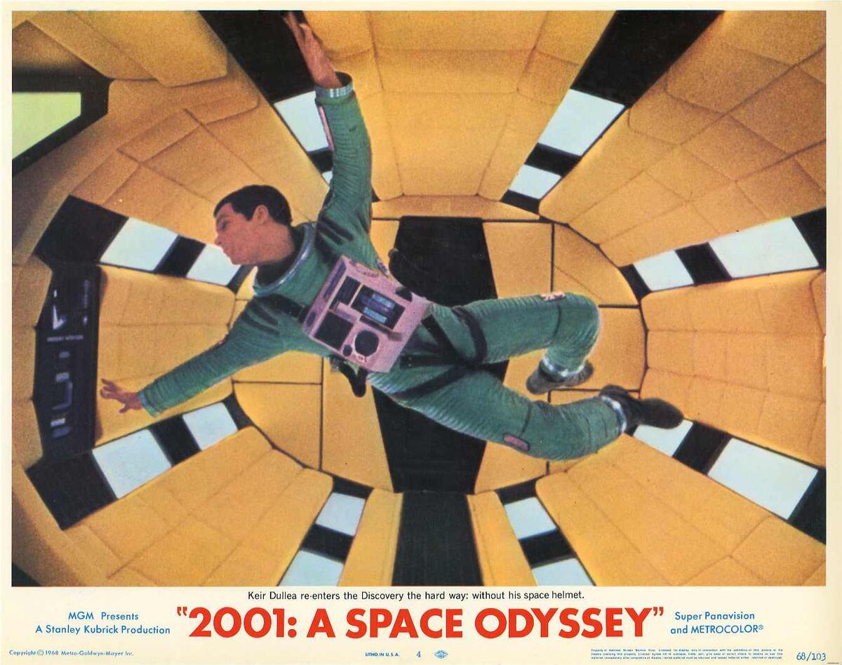 This is an old movie poster that depicts an astronaut in the center of the frame, floating inside a spaceship. 