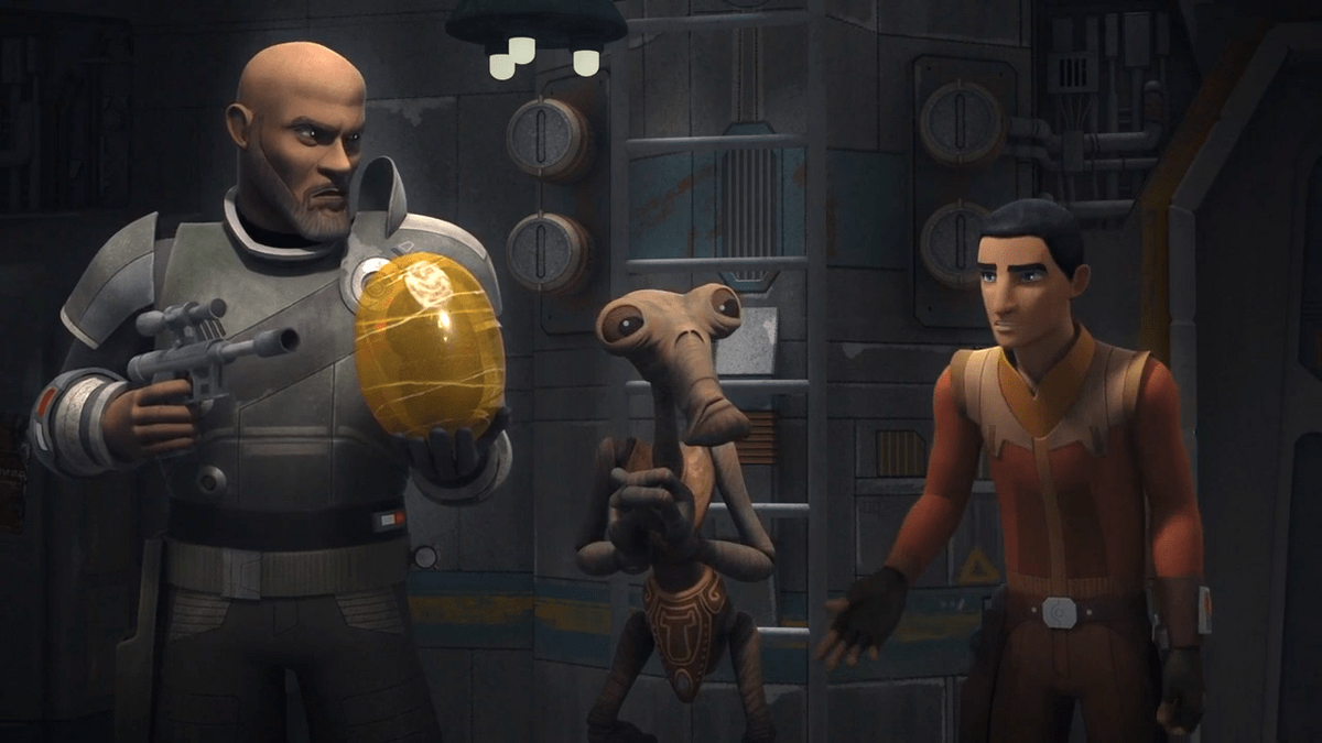 Saw Gerrera points a blaster at a large yellow egg.