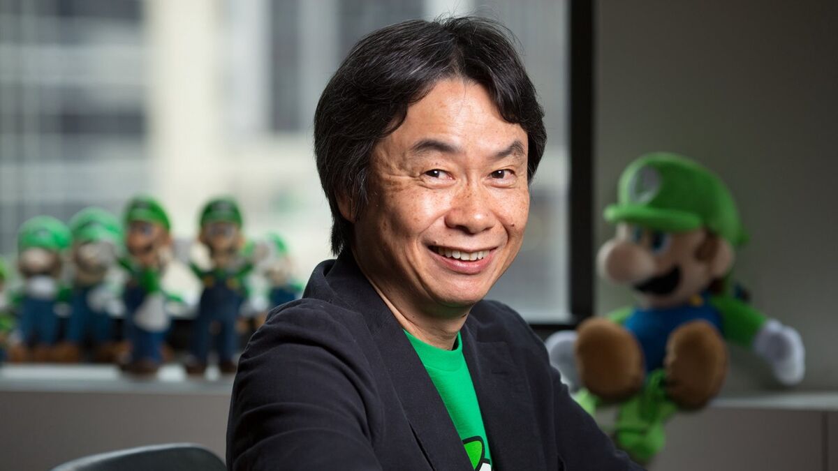 Shigeru Miyamoto, surrounded by an unsettling amount of Luigis