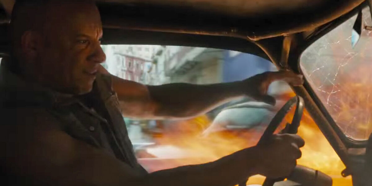 Vin-Diesel-as-Dominic-Toretto-in-The-Fate-of-the-Furious car on fire