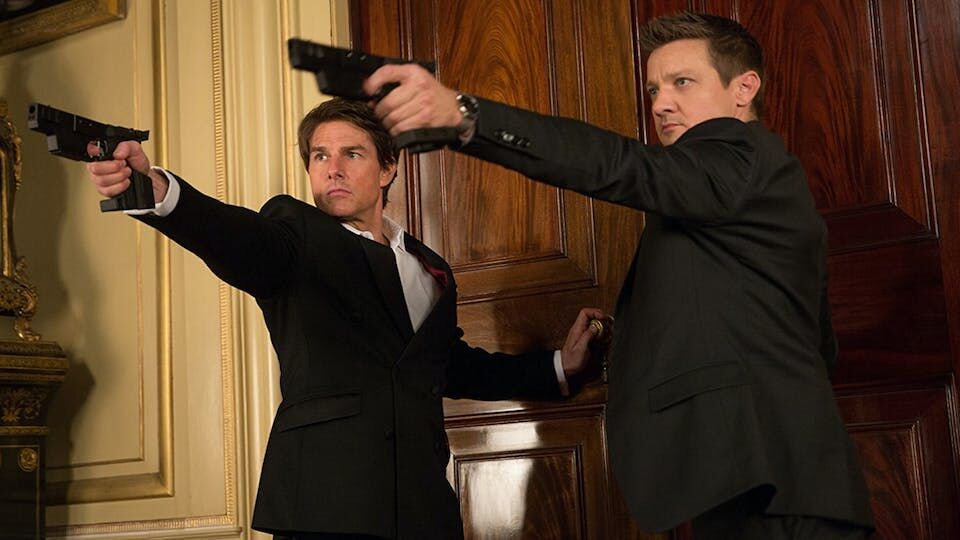 Tom Cruise as Ethan Hunt and Jeremy Renner as William Brandt in Mission: Impossible - Rogue Nation