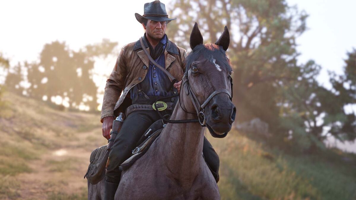 Arthur Morgan rides his horse in Red Dead Redemption 2.