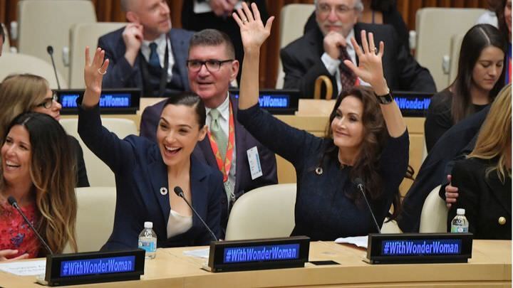NEW YORK, NY - OCTOBER 21: Actors Gal Gadot (L) and Lynda Carter wave to the audience at the Wonder Woman UN Ambassador Ceremony at United Nations on October 21, 2016 in New York City. (Photo by Mike Coppola/WireImage)