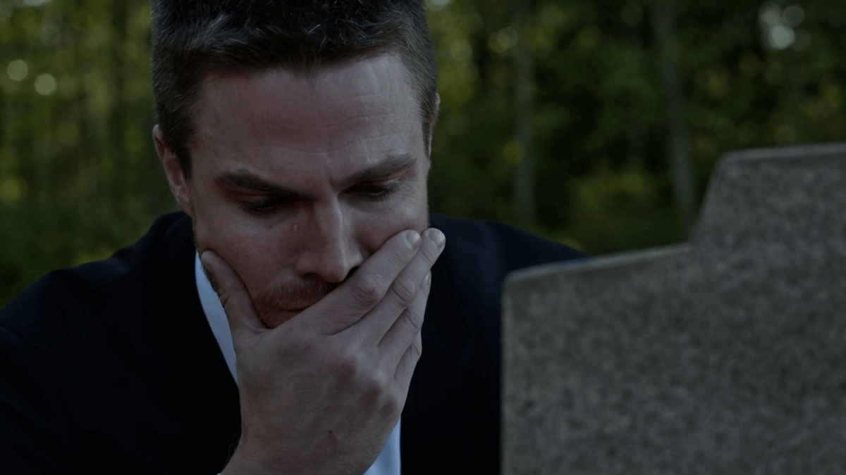 Oliver_shedding_tears_over_a_grave