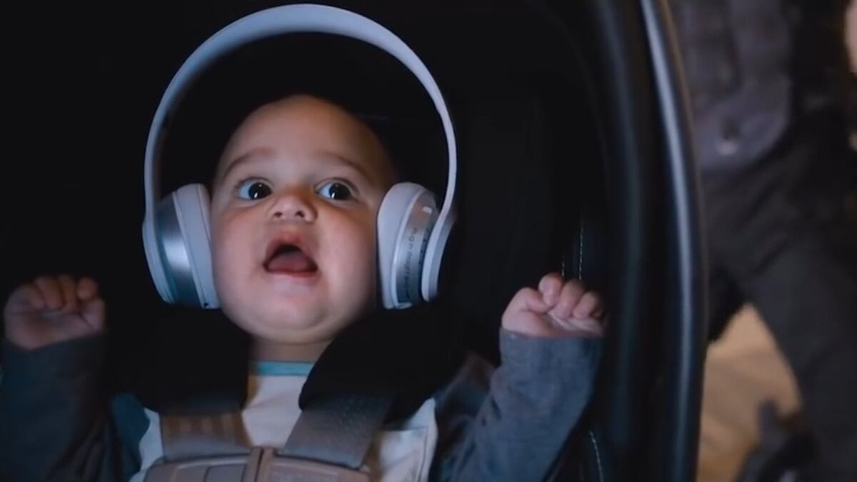 baby with headphones on in fate of the furious