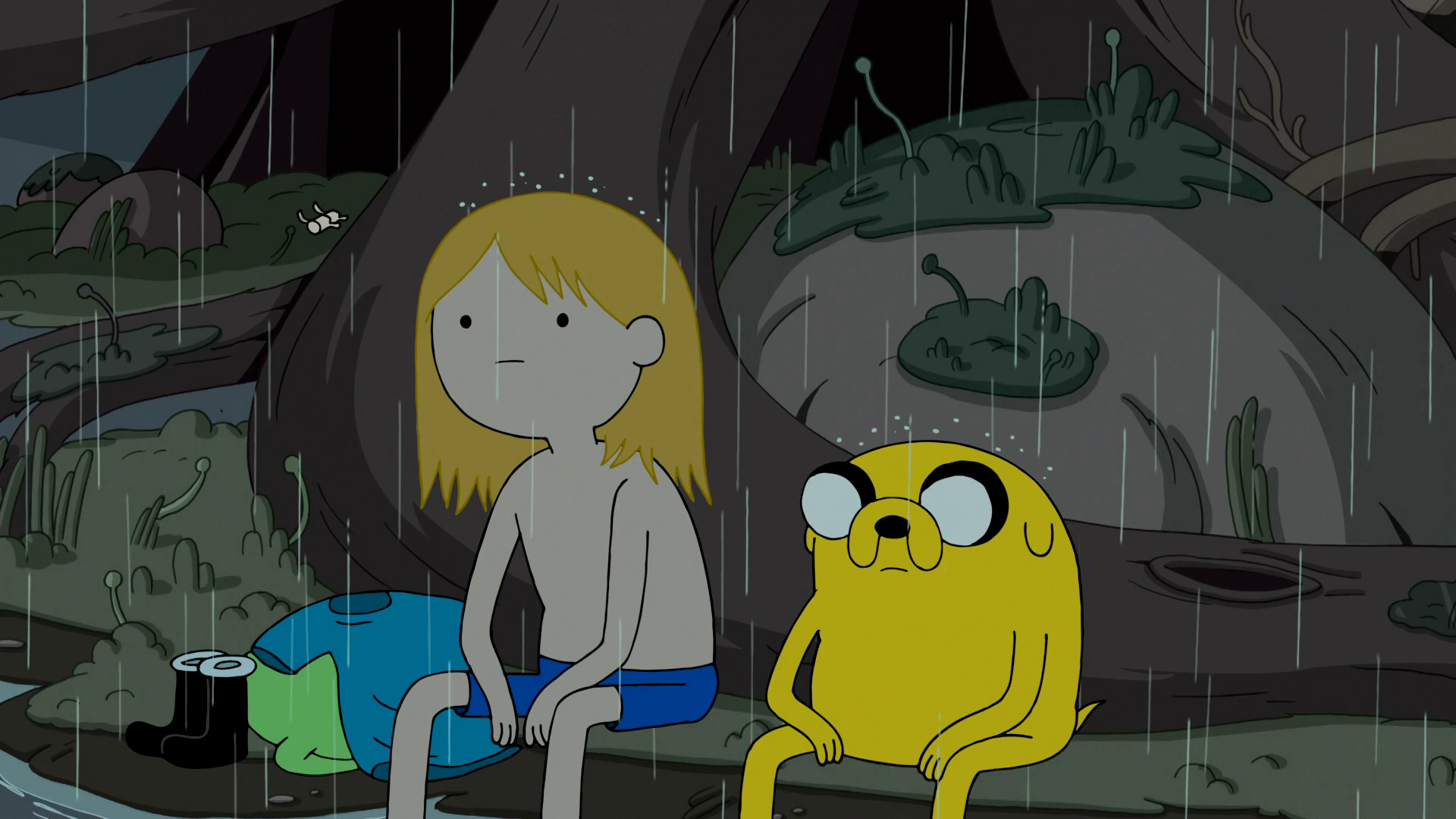 Фин и Джейк сидят под дождем