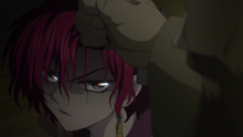 Yona glares at Kum-Ji