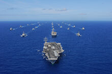 US Navy 100724-N-5684M-823 USS Ronald Reagan (CVN 76) transits the Pacific Ocean with ships assigned to Rim of the Pacific (RIMPAC) 2010 combined task force as part of a photo exercise north of Hawaii