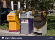 Drop-off-boxes-for-dhl-fedex-and-ups-next-to-each-other-in-key-west-B0D68G
