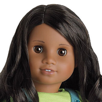 doll with brown curly hair and brown eyes