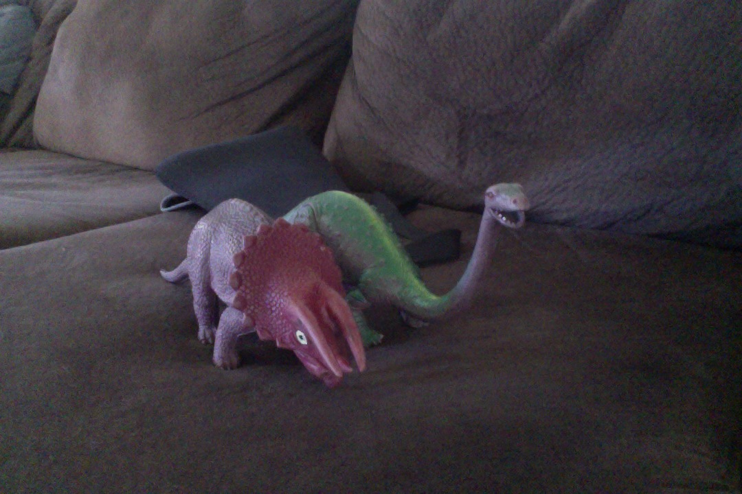 dinosaur with horn in back of head