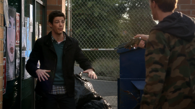 File:Posters near Barry Allen.png