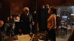 Rip Hunter's team in the Waverider's office