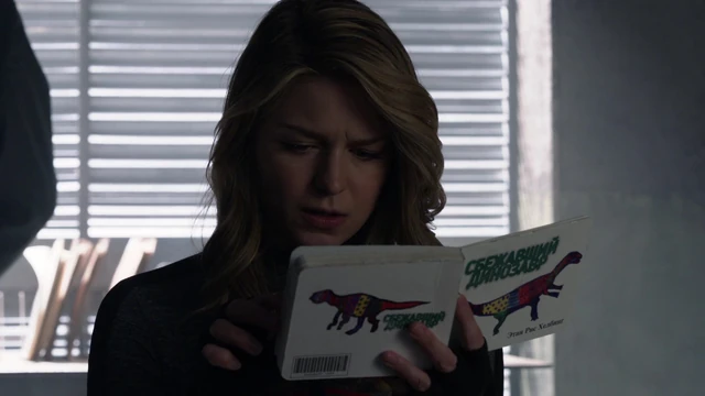 File:Red Daughter reading The Runaway Dinosaur.png