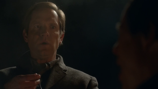 File:Eobard Thawne looks down at Harrison Wells.png
