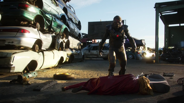 File:Reactron standing over Supergirl.png
