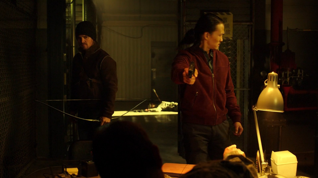 File:Oliver and Maseo attacks a rogue Army base in a vain attempt to save Akio's life.png