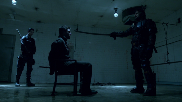 File:Slade points a katana at Oliver.png
