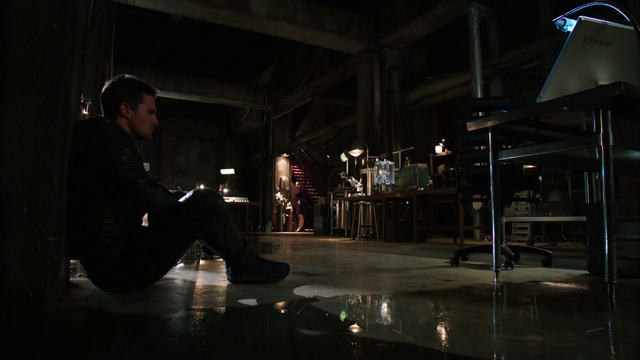 File:Oliver Queen in the Arrowcave after learning Walter is alive.png