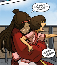 Kiyi wriggles out of Ursa's arms
