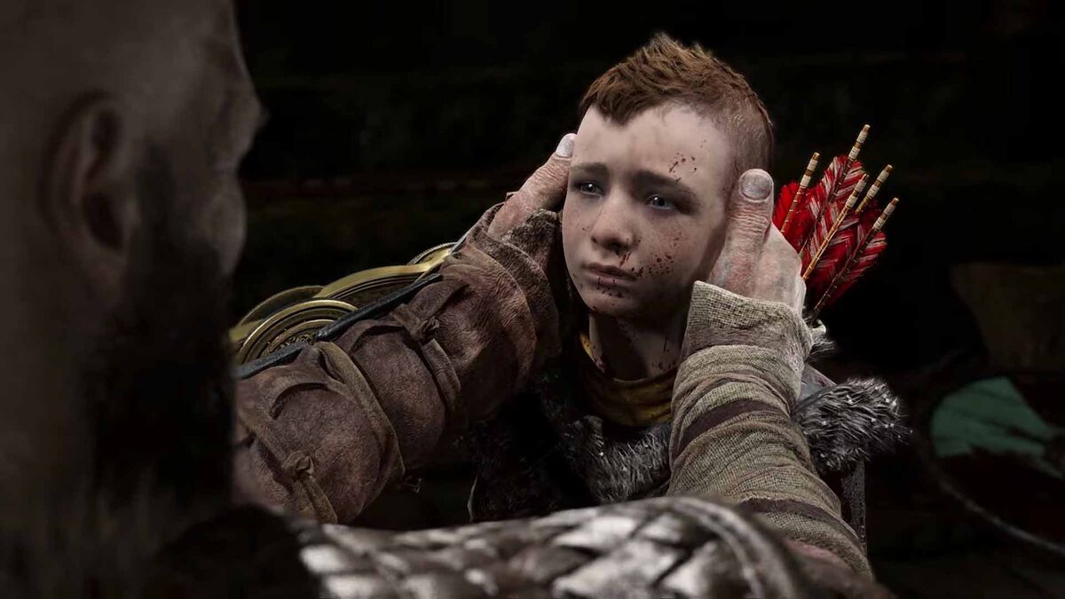 Kratos holds Atreus&#039; head gently