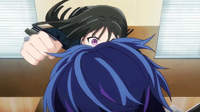 Kisara about to punch Rentaro